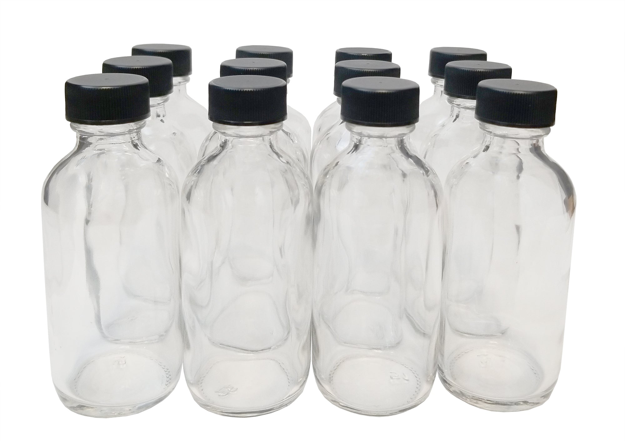 Bottle, Flint Glass Clear, 2oz with Cap. Case 144.